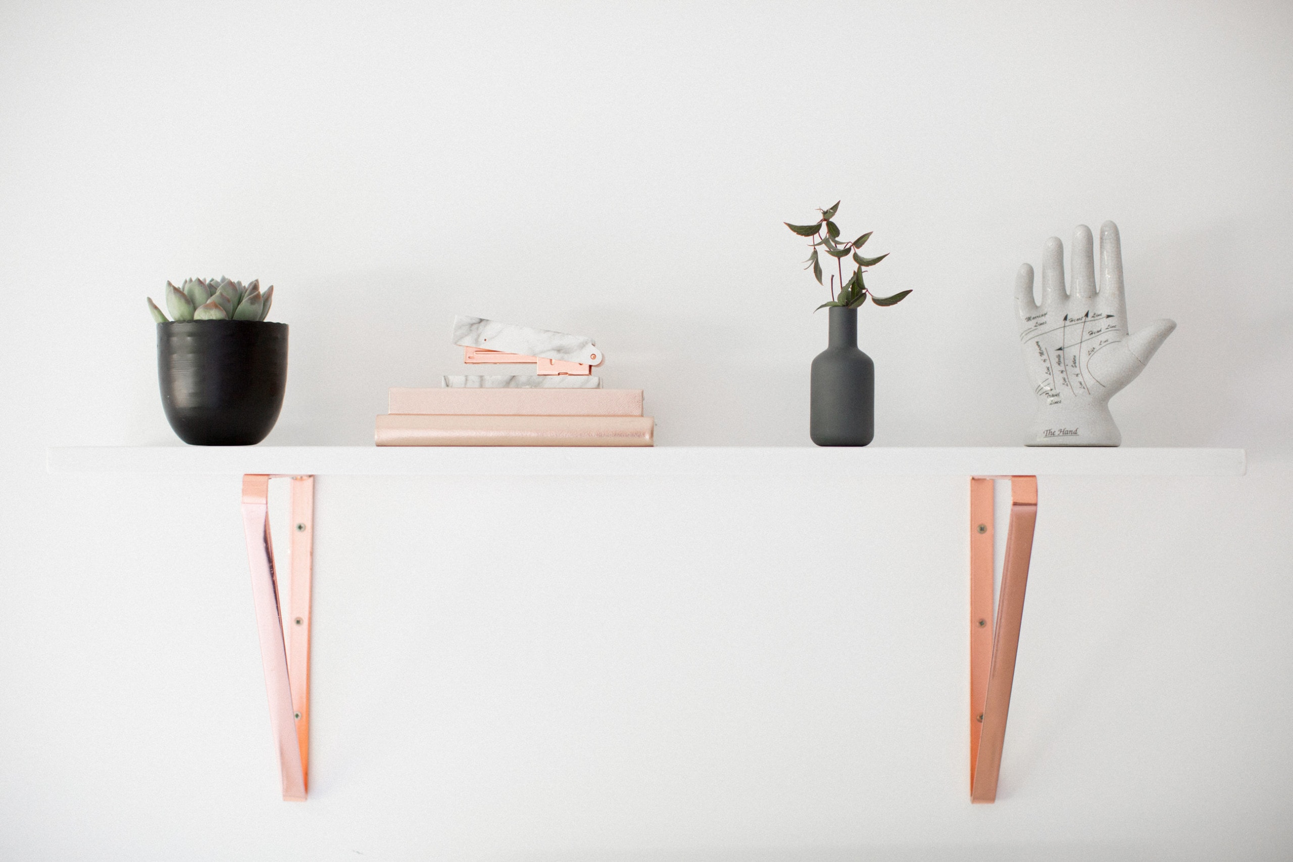 notebooks stapler shelf home interior succulent plant pot plant