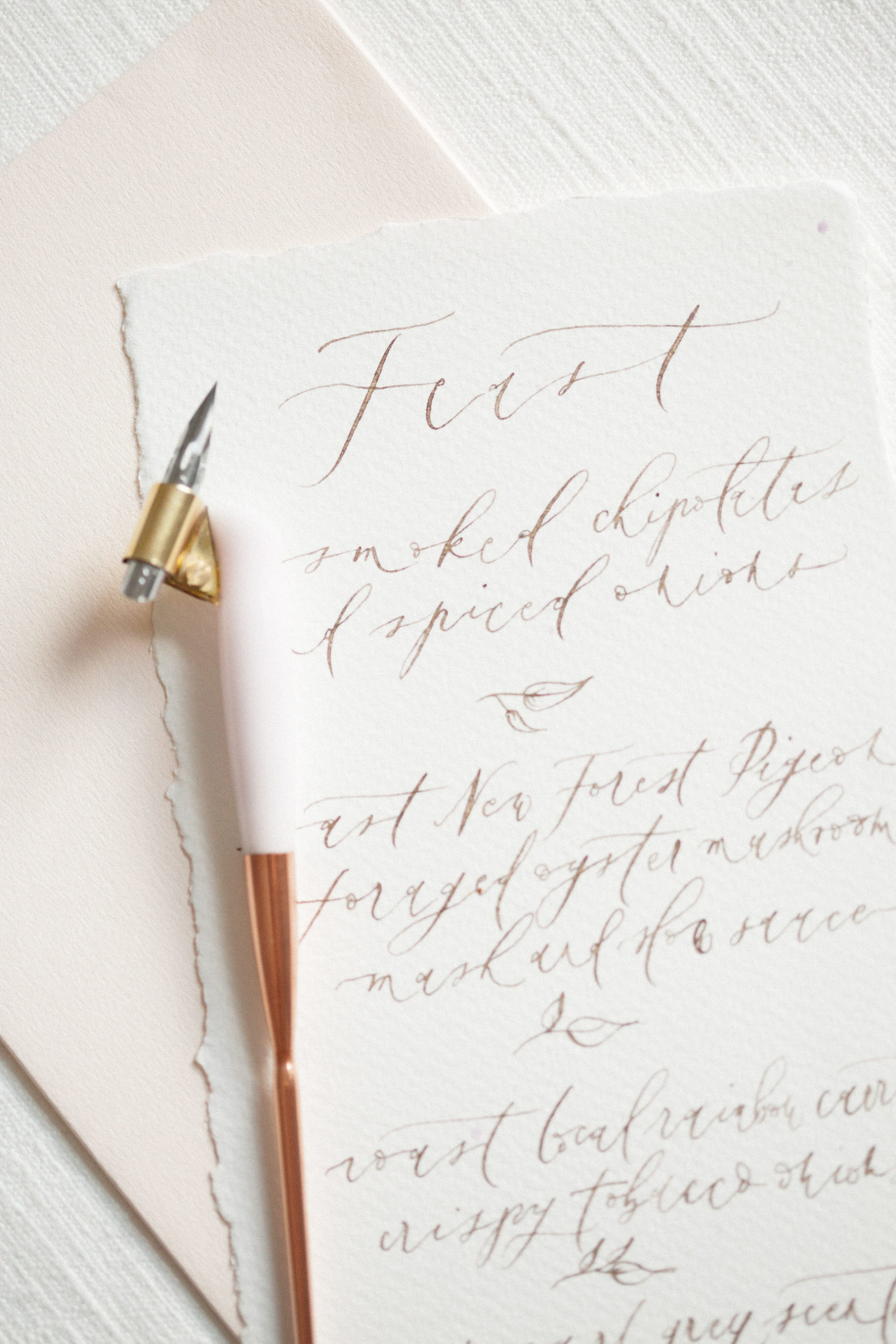 calligraphy pen flat lay styled stock photography