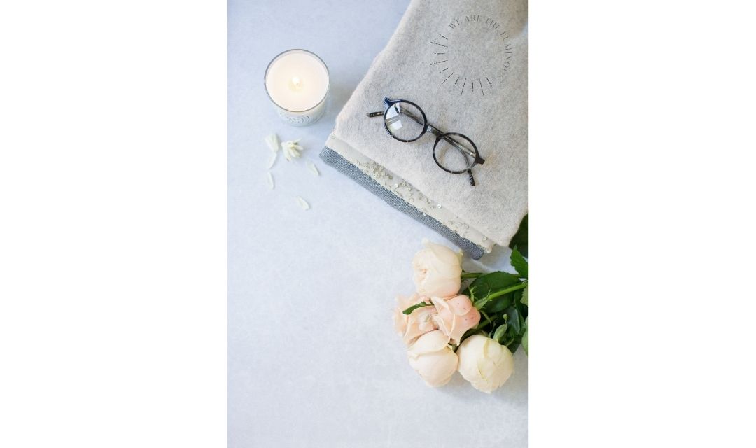 glasses and a bunch of roses
