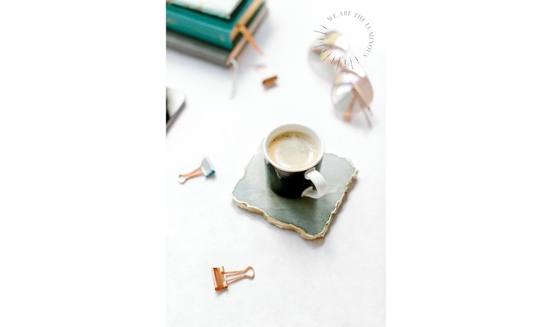 black coffee with pink stationery