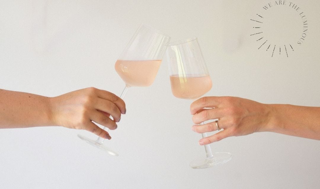 rose glasses toasting stock image