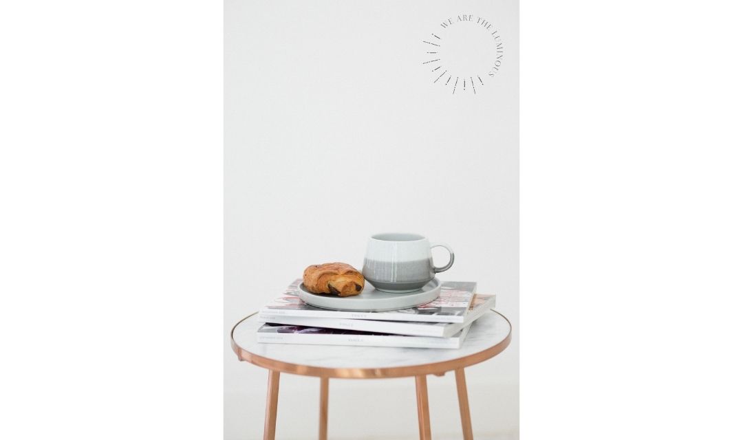 coffee cup on magazines