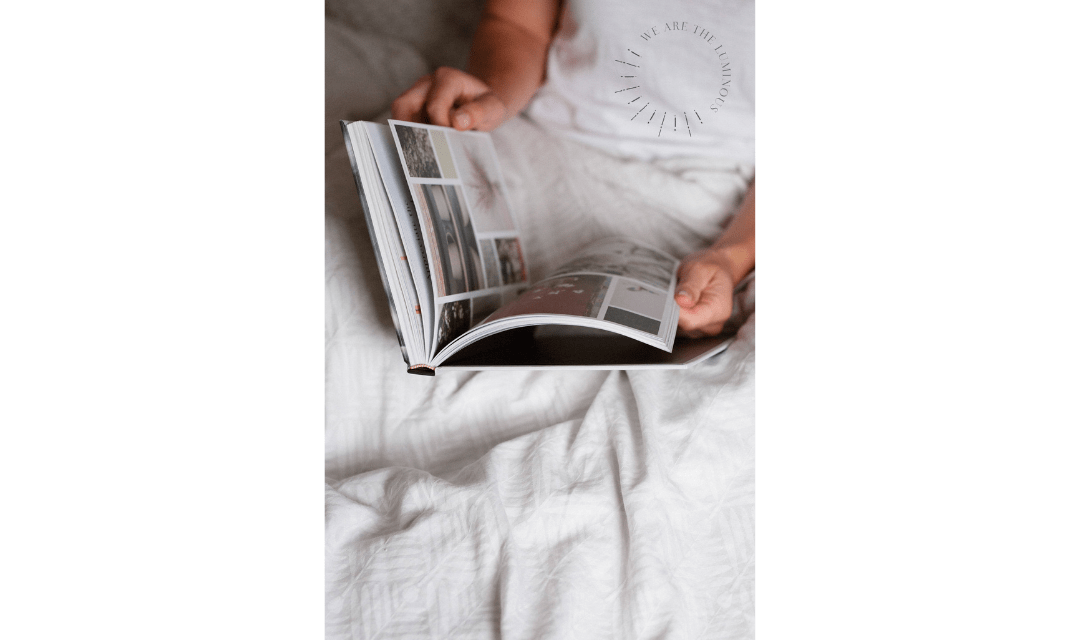 hands holding magazine stock image