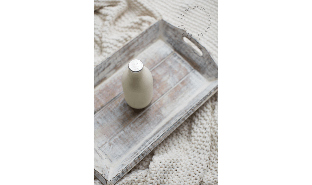 white milk bottle on tray stock image