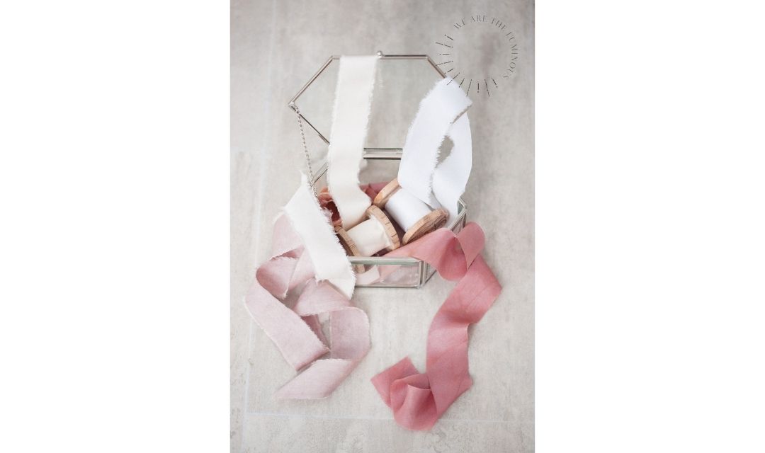 silk ribbons in glass box