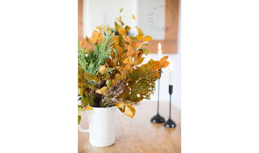 autumn fall flowers and foliage in vase