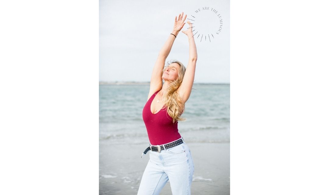 lady in pink top on beach