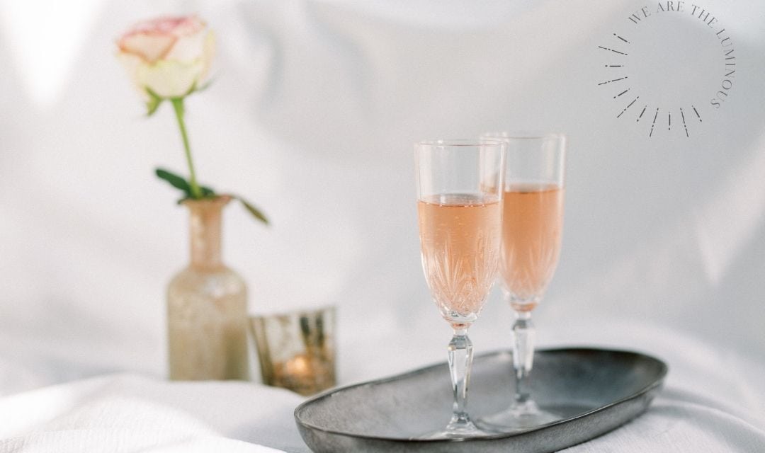 two glasses of pink champagne
